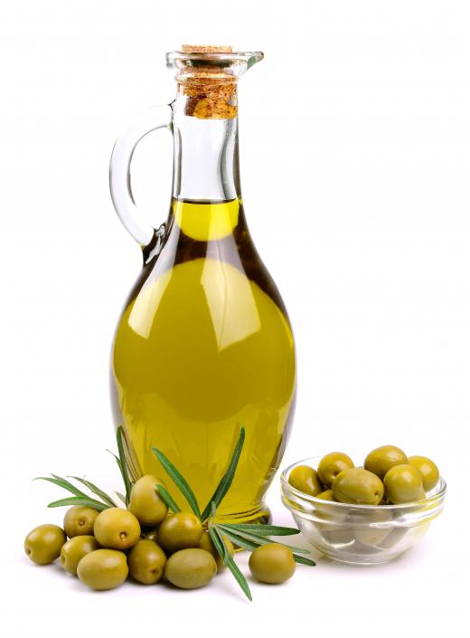 Olive oil is typically used on the bread before the addition of tomatoes for bruschetta.