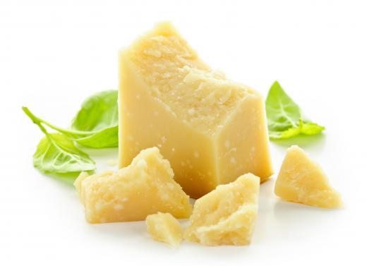 Parmesan cheese can be used to top plain or sauced rotelle pasta.