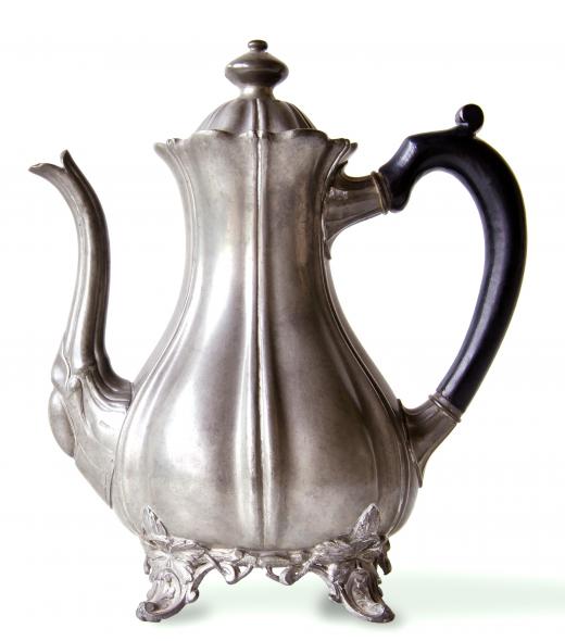 A pewter teapot.