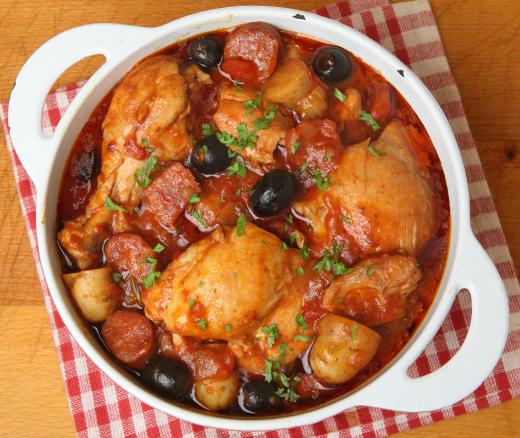 Rustic French chicken stew with marjoram and black olives.