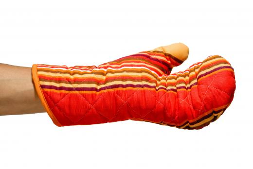 Traditional quilted oven mitts are coated with silicone spray by provide protection only up to 200°F (93.3°C).