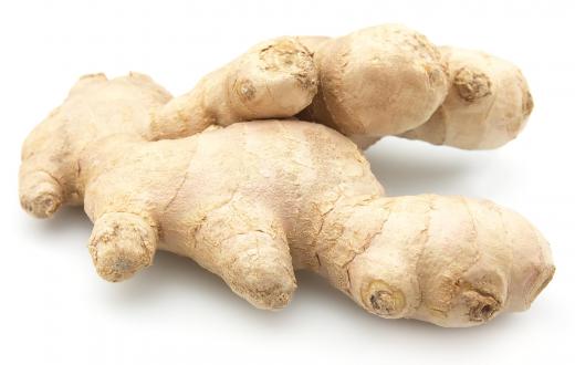 A ginger grater is used to grate and mince raw ginger.