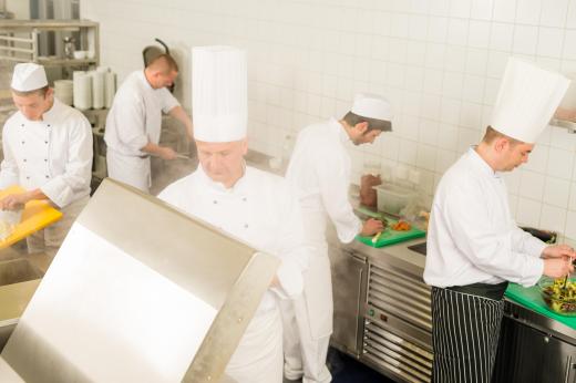 A chef trainee may be tasked with preparing side dishes.