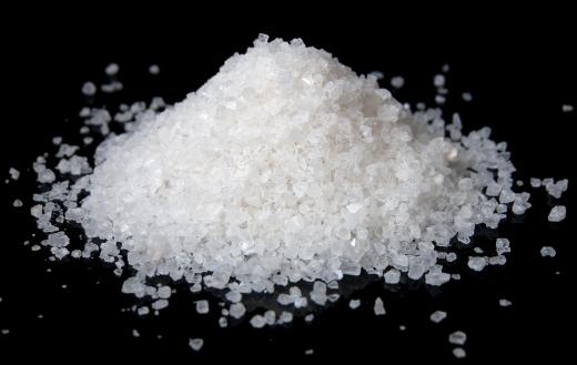 Table salt typically has smaller-sized grains than rock salt which has larger chunks.