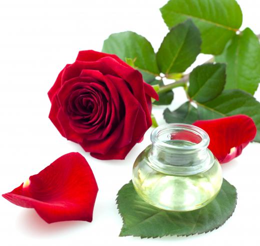 Rose water and a red rose.