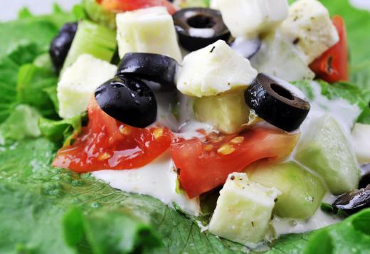 Chopped Greek salad with feta, cucumbers, and tomatoes.