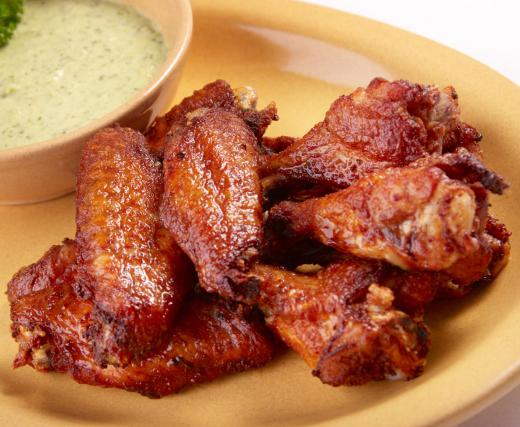 An American version of tapas might include chicken wings.