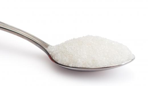 A spoon of isomalt, a sugar substitute made from beet sugar.