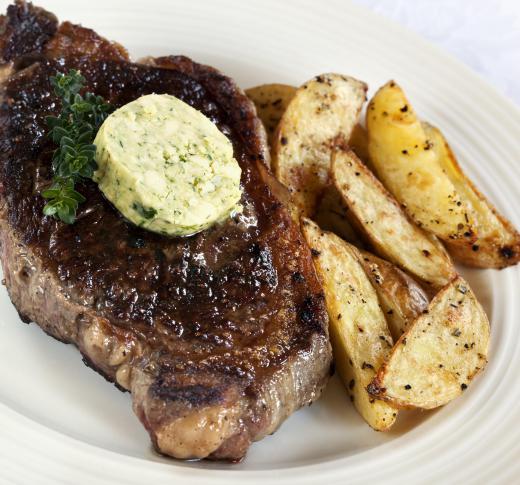 Steak with truffle butter and Greek potatoes.