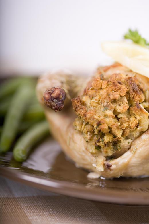 A cornish hen cooked with stuffing.