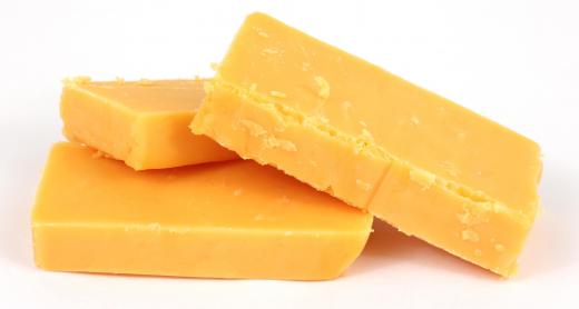 Processed cheese usually contains cheddar or colby.