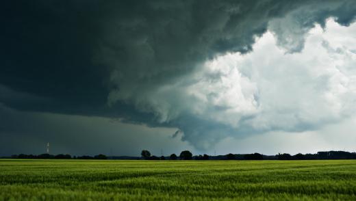 A tornado, which often takes the shape of a funnel.