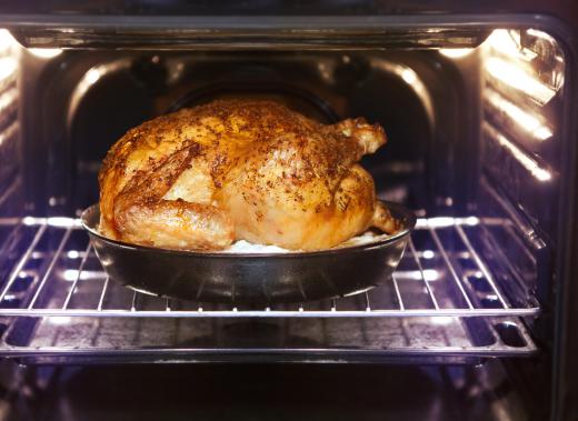 A turkey breast may be thawed in the oven, but it will take a considerable amount of time.