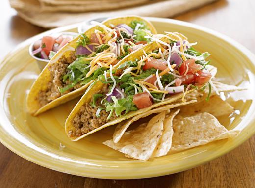 Vegetarian meat crumbles can be used in tacos.