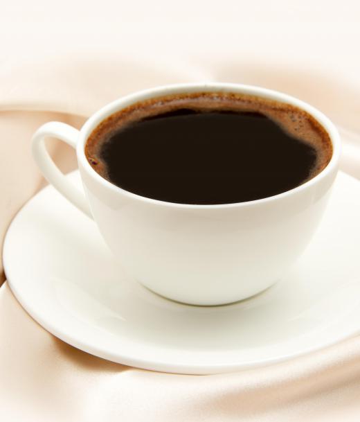 A cup of coffee may help to balance out the sweetness of a fasnacht.