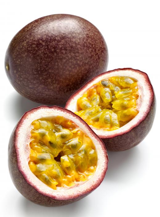 Whole and cut passion fruit.