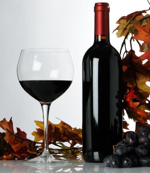 The grapes used in red wine are processed with their skin intact.