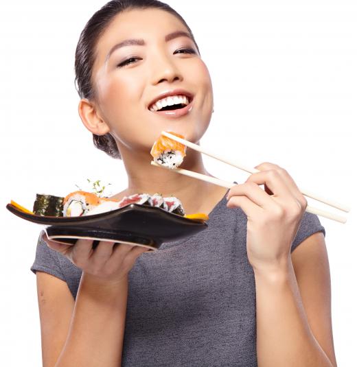 A chopstick rest prevents chopsticks from making contact with the dining table.